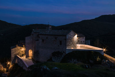 Illuminated historic building against sky at night