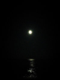 Scenic view of moon against sky at night