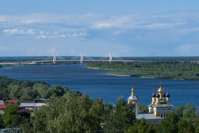 Bridge over sea against sky