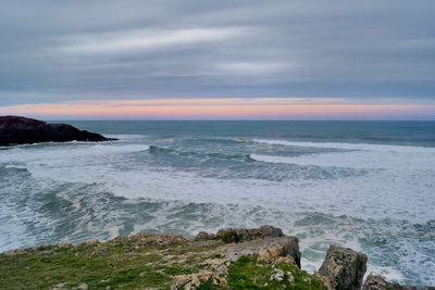 Scenic view of sea against sky during sunset