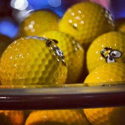 Close-up of lemons on wooden table