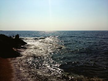 Scenic view of sea against clear sky