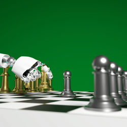 Close-up of chess pieces on table