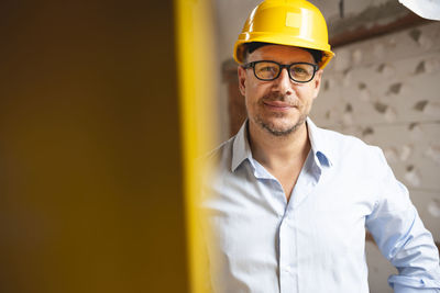 Portrait of smiling man wearing hat