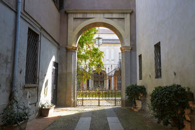 A gate of a historical palace located in the center of crema in italy