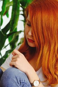 Midsection of woman looking away