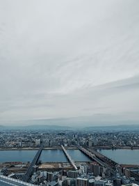 High angle view of bridge over river against sky