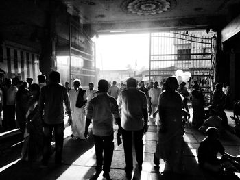 Group of people walking in building
