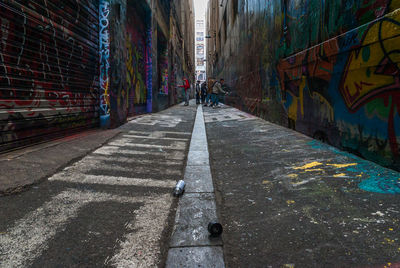 People on sidewalk in city