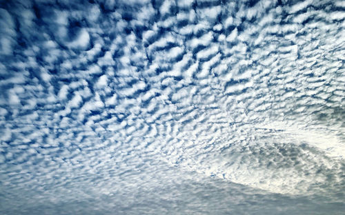 Full frame shot of snow covered blue sky