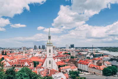 High angle view of buildings in city against sky