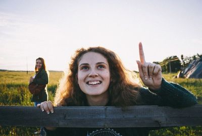 Female friends enjoying in a field