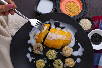 High angle view of fruit served on table