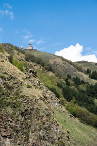 Gergeti trinity church at the summit, stepantsminda, aka kazbegi, georgia.