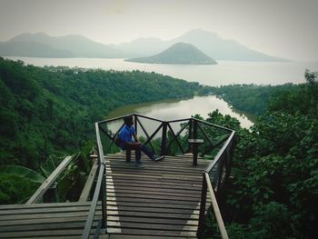 Scenic view of gazebo by mountains against sky