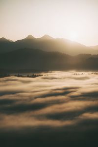 Scenic view of mountains against sky during sunset