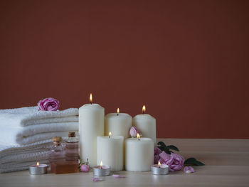 Close-up of candles on table