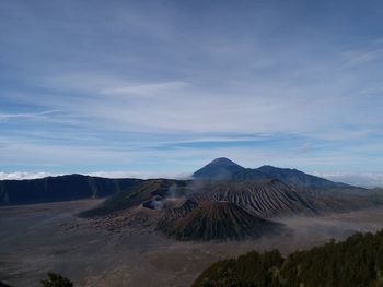 Scenic view of volcanic landscape against sky