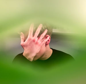 Digital composite image of woman hand on leaf