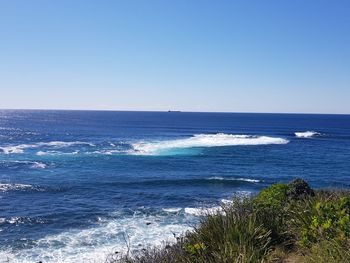 Scenic view of sea against clear sky