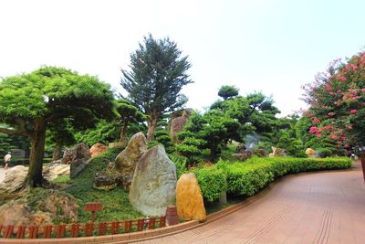 Statue in park against clear sky