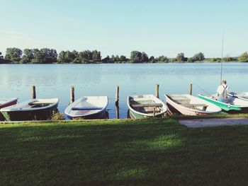 Boats in calm lake