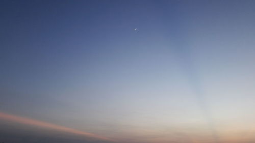 Low angle view of moon in sky