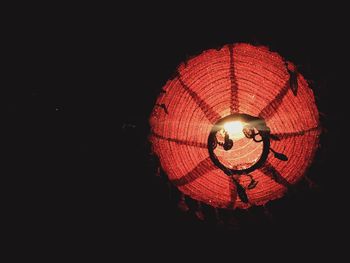 Close-up of illuminated light bulb