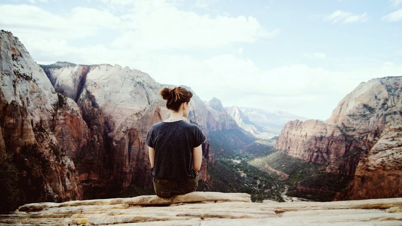 mountain, rock - object, rear view, rock formation, tranquil scene, sky, lifestyles, tranquility, leisure activity, full length, scenics, mountain range, beauty in nature, nature, hiking, cloud - sky, standing, landscape