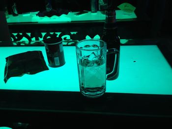 Close-up of beer bottle on table