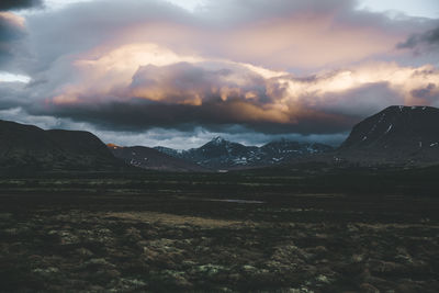 Scenic view of mountains against sky during sunset