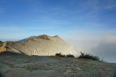 Panoramic view of volcanic landscape against sky