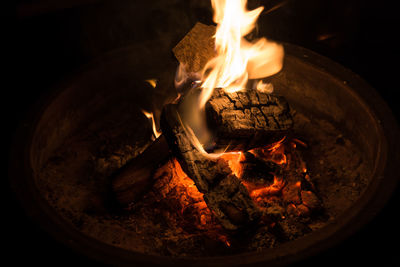 High angle view of bonfire at night