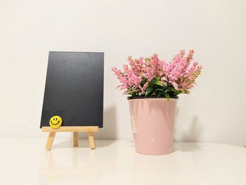 Close-up of flower vase on table