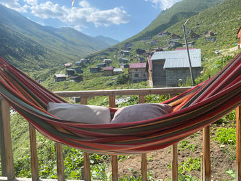 High angle view of park by buildings against sky