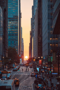 Illuminated city street at night