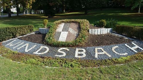 High angle view of text on field at park