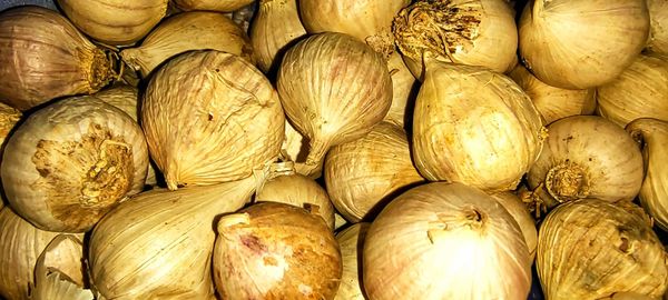 Full frame shot of onions for sale in market