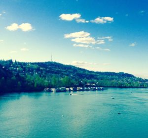 Scenic view of sea against cloudy sky
