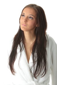 Portrait of a beautiful young woman over white background
