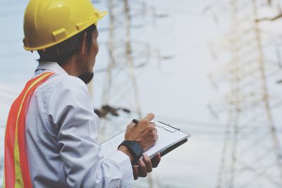 Man working on mobile phone