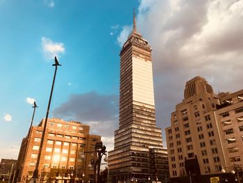 Low angle view of skyscrapers against sky