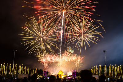 Low angle view of sky illumed with fire crackers