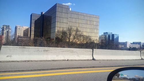 Modern buildings against blue sky