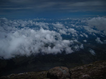 Scenic view of clouds over mountain