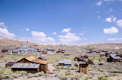 Houses and buildings against sky