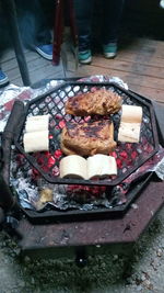 High angle view of food on barbecue grill