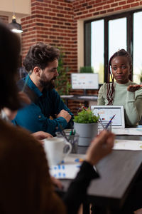 Business colleagues working in office