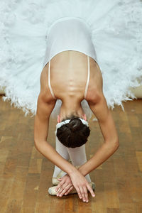 Ballet dancer dancing on floor