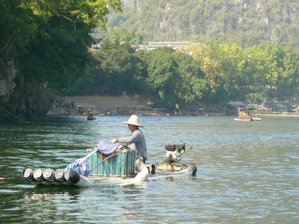 BOATS IN RIVER